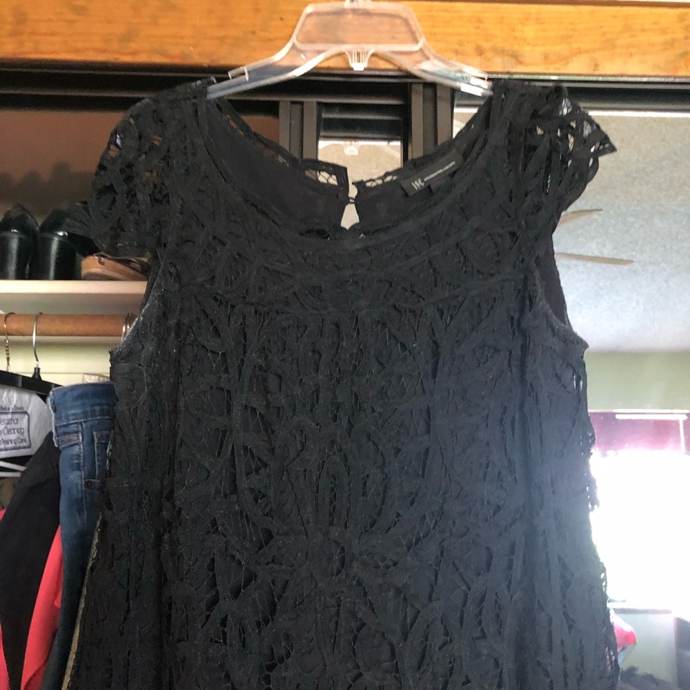 Lace blouse. Neck button.